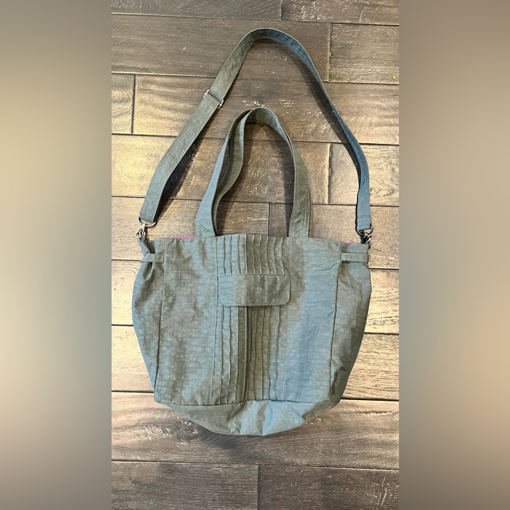 Gray handmade crossbody bag with hot pink inside lining